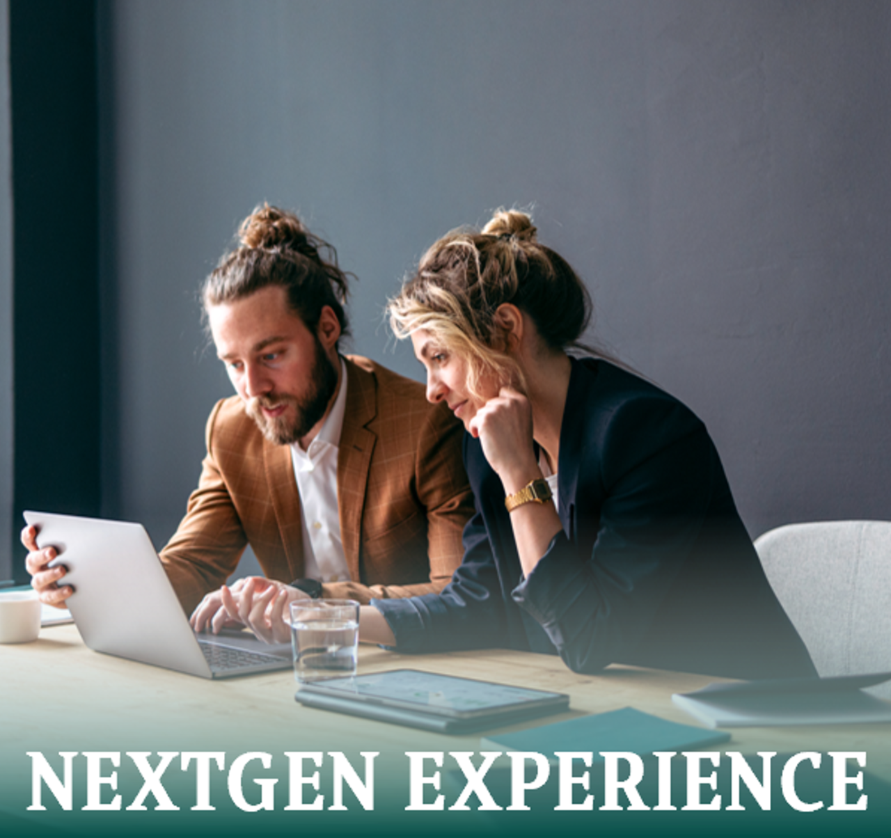 A men and a women working in front of a desk